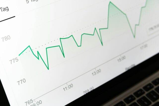 An analytics dashboard screen displaying peaks and valleys on a line chart. Photographed by Markus Winkler on Unsplash.